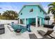 Private pool with patio, lounge chairs, and home gym visible at 17706 1St E St, Redington Shores, FL 33708