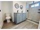 Updated bathroom, double vanity, and walk in shower at 1833 Knollwood Dr, Holiday, FL 34690