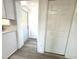 Convenient laundry closet with hookups and extra storage at 1833 Knollwood Dr, Holiday, FL 34690