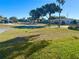 Quiet residential street with neatly kept homes and landscaping at 1833 Knollwood Dr, Holiday, FL 34690