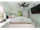 Relaxing bedroom with a king-size bed and a ceiling fan at 2109 Elmwood Ct, Plant City, FL 33563