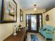 Inviting entryway with a wooden console table and bench at 2109 Elmwood Ct, Plant City, FL 33563