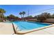 Relaxing community pool with plenty of lounge chairs at 2685 Sabal Springs Cir # 202, Clearwater, FL 33761