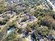 Aerial showing community with ample parking and lush landscaping at 2912 Star Apple Ct, Palm Harbor, FL 34684