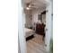 Bright bedroom with light gray flooring and a ceiling fan at 2912 Star Apple Ct, Palm Harbor, FL 34684