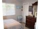Bedroom with double bed and dresser at 2912 Star Apple Ct, Palm Harbor, FL 34684