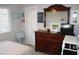 Bedroom with a double bed and dresser at 2912 Star Apple Ct, Palm Harbor, FL 34684