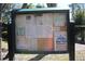 Community bulletin board with various notices at 2912 Star Apple Ct, Palm Harbor, FL 34684