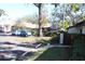 Exterior view of condo community, showing building and parking at 2912 Star Apple Ct, Palm Harbor, FL 34684