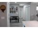 Hallway with seating, modern decor, and access to closet space at 2912 Star Apple Ct, Palm Harbor, FL 34684