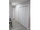 Hallway with additional storage and built-in shelving at 2912 Star Apple Ct, Palm Harbor, FL 34684