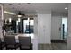 Updated kitchen with island, stainless steel appliances, and white cabinets at 2912 Star Apple Ct, Palm Harbor, FL 34684