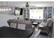 Spacious living room with built-in shelving and comfy seating at 2912 Star Apple Ct, Palm Harbor, FL 34684