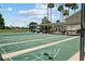 Expansive shuffleboard courts near clubhouse at 29242 Caddyshack Ln, San Antonio, FL 33576