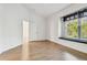 Comfortable bedroom with hardwood floors and a window seat at 2932 Tanglewylde Dr, Land O Lakes, FL 34638