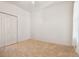 Spacious bedroom featuring neutral walls and carpet at 2932 Tanglewylde Dr, Land O Lakes, FL 34638