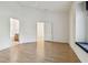 Spacious main bedroom with hardwood floors and bathroom access at 2932 Tanglewylde Dr, Land O Lakes, FL 34638