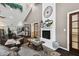 Relaxing lounge with fireplace and comfortable seating at 2932 Tanglewylde Dr, Land O Lakes, FL 34638