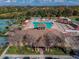 Resort-style pool with expansive sundeck and shaded seating areas at 2932 Tanglewylde Dr, Land O Lakes, FL 34638