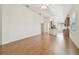 Bright living room featuring hardwood floors and an open floor plan at 2932 Tanglewylde Dr, Land O Lakes, FL 34638