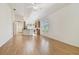 Spacious living area with hardwood floors and kitchen views at 2932 Tanglewylde Dr, Land O Lakes, FL 34638