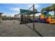 playground with swings and play structures at 2932 Tanglewylde Dr, Land O Lakes, FL 34638