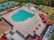 Large community pool with plenty of lounge chairs at 2932 Tanglewylde Dr, Land O Lakes, FL 34638