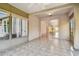 Sunroom with access to the living area and backyard views at 2932 Tanglewylde Dr, Land O Lakes, FL 34638