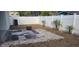 Small backyard with fire pit and partially paved patio at 3611 19Th N St, St Petersburg, FL 33713