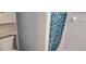 Clean bathroom with shower, toilet, and built-in cabinet at 3611 19Th N St, St Petersburg, FL 33713