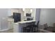 Modern kitchen featuring white cabinets, quartz countertops and stainless steel appliances at 3611 19Th N St, St Petersburg, FL 33713