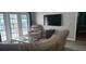 Relaxing living room with a sectional sofa and glass-top coffee table at 3611 19Th N St, St Petersburg, FL 33713