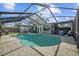 Screened pool and patio area, ideal for outdoor entertaining at 4003 W Tyson Ave, Tampa, FL 33611