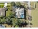 Overhead view of house with pool and backyard at 456 Diamond Dr, Spring Hill, FL 34609