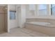 Large bathroom with a garden tub and walk-in shower at 456 Diamond Dr, Spring Hill, FL 34609