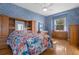 Bedroom with wood flooring, built-in shelving, and window seat at 456 Diamond Dr, Spring Hill, FL 34609