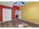 Bedroom with wood flooring, and two-tone painted walls at 456 Diamond Dr, Spring Hill, FL 34609