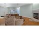 Living room with a large sectional sofa and fireplace at 456 Diamond Dr, Spring Hill, FL 34609