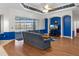 Bright living room with wood floors and access to pool area at 456 Diamond Dr, Spring Hill, FL 34609
