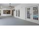 Spacious screened lanai with access to the pool and backyard at 456 Diamond Dr, Spring Hill, FL 34609