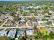 Wide shot of the house and neighborhood at 4629 Spahn St, Sarasota, FL 34232