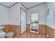 Bright entryway with wood flooring and a white door at 4853 Blanco Dr, Zephyrhills, FL 33541