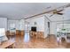 Open living room and dining area with hardwood floors at 4853 Blanco Dr, Zephyrhills, FL 33541