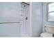 Shower stall with glass door and built in shelving at 4853 Blanco Dr, Zephyrhills, FL 33541