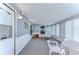 Spacious sunroom with multiple seating options at 4853 Blanco Dr, Zephyrhills, FL 33541
