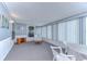 Bright sunroom with window seating and dining area at 4853 Blanco Dr, Zephyrhills, FL 33541
