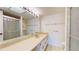 Bathroom with single vanity, shower, and toilet at 500 N Osceola Ave # 406, Clearwater, FL 33755
