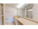 Bathroom with single vanity, shower, and toilet at 500 N Osceola Ave # 406, Clearwater, FL 33755