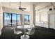 Community room with tables, chairs, bar, and large windows overlooking the water at 500 N Osceola Ave # 406, Clearwater, FL 33755