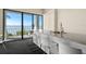 Community room with bar, seating, and large windows offering water views at 500 N Osceola Ave # 406, Clearwater, FL 33755